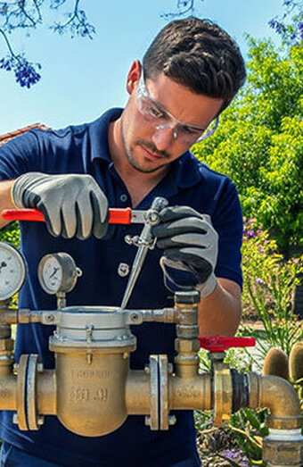 Plumber Checking Water Meter
